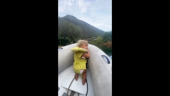 Little girl enjoys boat ride in Kotor, Montenegro
