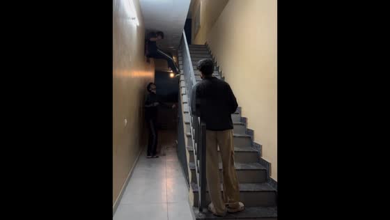 Teen falls off stairs while talking on the phone in Jalandhar, India  