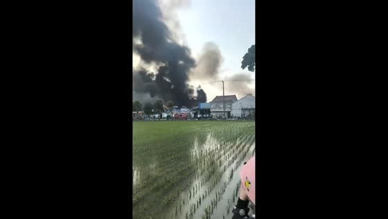 Fire sends thick smoke over Luodian Town in Shanghai, China