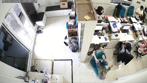 Chair tumble during workplace stretch captured on video