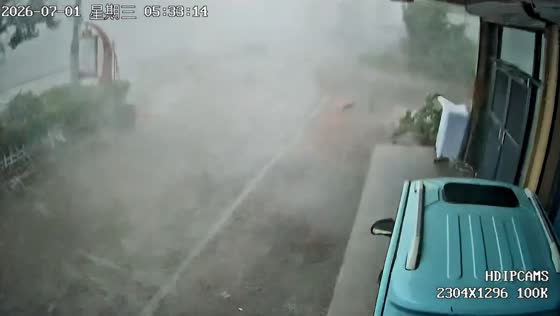 Powerful storm winds blow parked e-bike across pavement in Jiangsu, China
