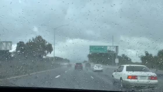 Isolated rain shower during commute in Pleasanton, California, USA