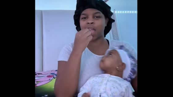 Baby's reaction to shared snacks in Detroit, Michigan