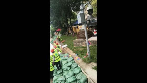 Construction workers repair water supply system near river in Yunnan, China