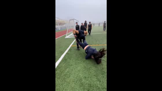 Shoulder ride mishap on football field in Curauma, Chile