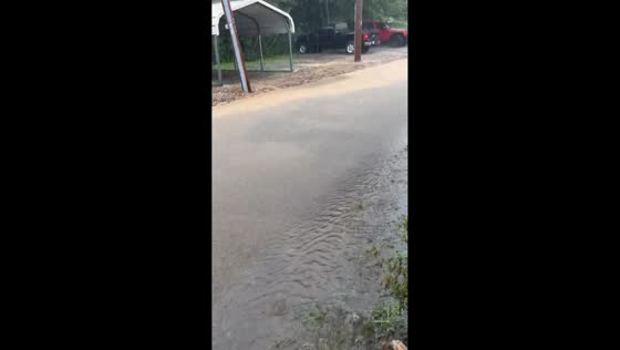 Heavy summer rain drenches streets in Mena, Arkansas