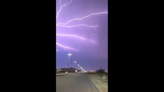 Nighttime thunderstorm illuminates sky over in Yanbu, Saudi Arabia