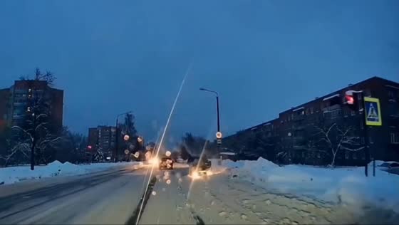 Car overturns after skidding into snowdrift on Silkina Street in Sarov, Russia