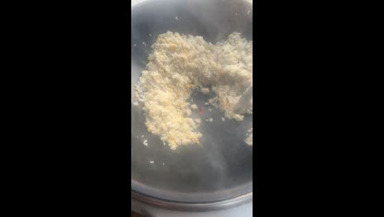 Wok develops hole while cooking fried rice in Jiangsu, China
