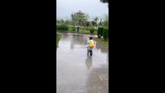 Child crashes into a gutter while riding a bicycle in Qinghai, China
