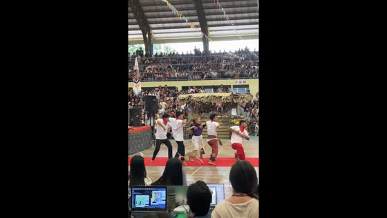 Dog joins performance on stage in Mati, Philippines