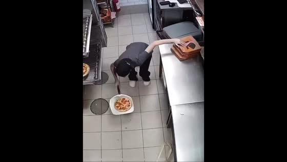 Woman saves falling pizza with quick reflexes in Bashkortostan, Russia