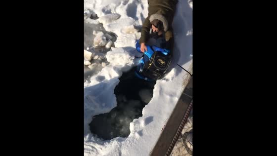 A young woman saves a 7-year-old boy who has fallen through ice in Russia