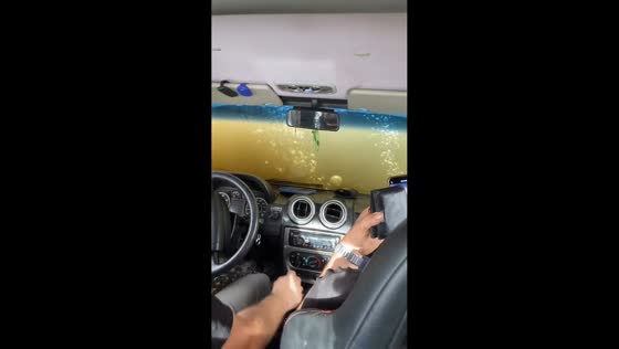 Vehicle gets stuck and flooded on muddy coast in Rio Grande do Sul, Brazil