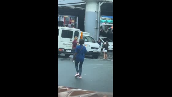 Bottling balance: woman masters the art of balancing a 1.5 liter royal soft drink on her head
