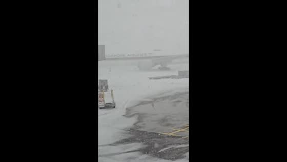Heavy snow disrupts operations at Charles de Gaulle Airport Terminal 1 in Paris, France
