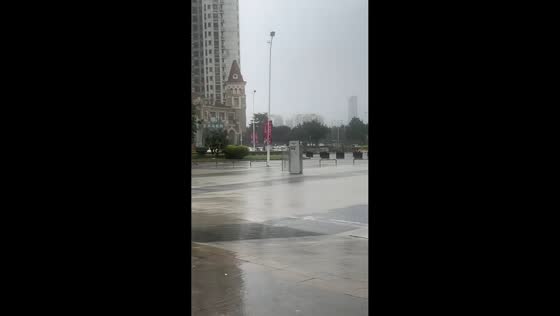 Empty refrigerator swept away by strong winds on street in Guangdong, China