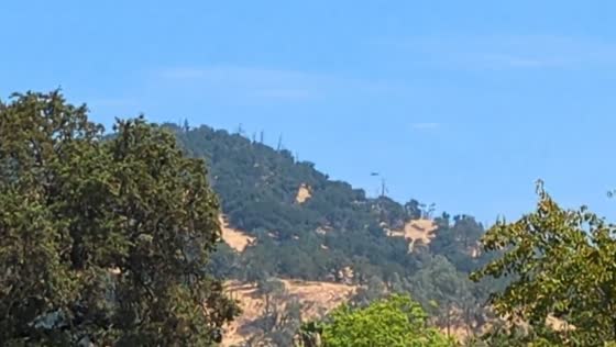 Helicopters aid firefighters during Pickett Fire in Calistoga, California