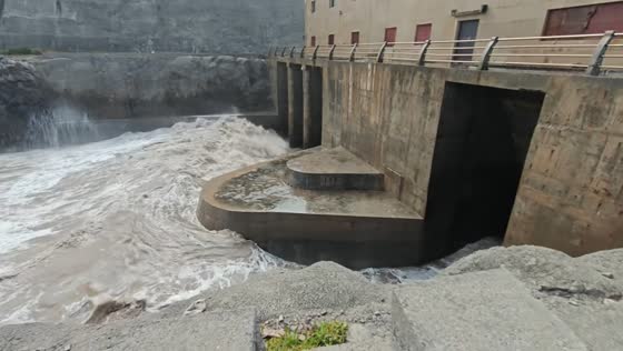 Massive sea waves crash against a seawall in Zhejiang, China