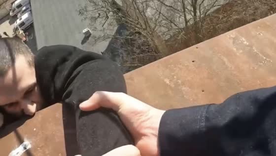 Police in St. Petersburg save man attempting to jump off roof