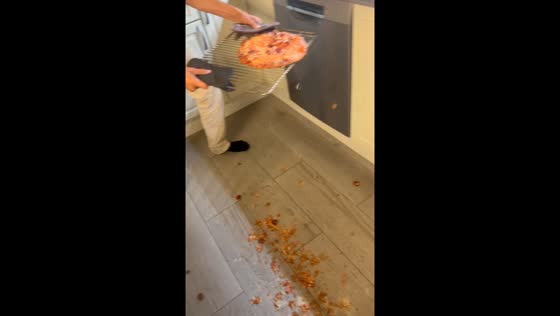 Pizza mishap in Norway: toppings fall through grill in hilarious cooking fail