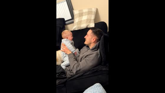 Baby laughs at father’s peekaboo in Antrim, Ireland