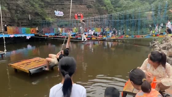 Man slips and falls into river in Henan, China