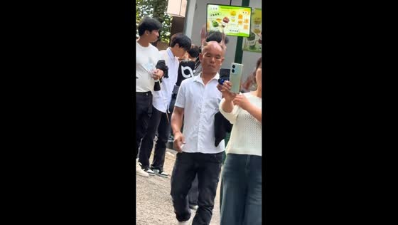 Man sports unique twin-feather hairstyle in Jiangsu, China