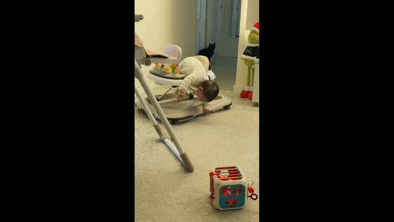Baby slips out of walker and crawls confidently in Andalusia, Spain