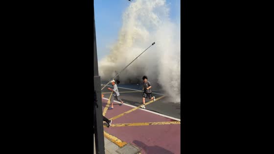 Powerful Qiantang River “Ghost King Tide” wave crashes over barrier in Zhejiang, China