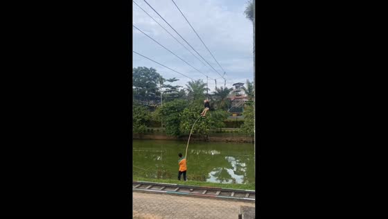 Woman gets stuck on zipline and rescued in Jambi, Indonesia