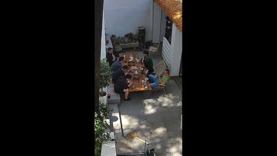 Tree branch falls onto outdoor dining table in Shaanxi, China