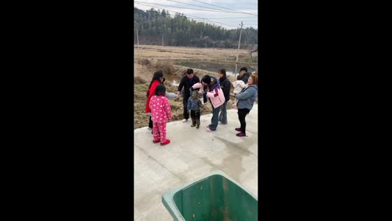 Young boy slips into mud in Jiangxi, China