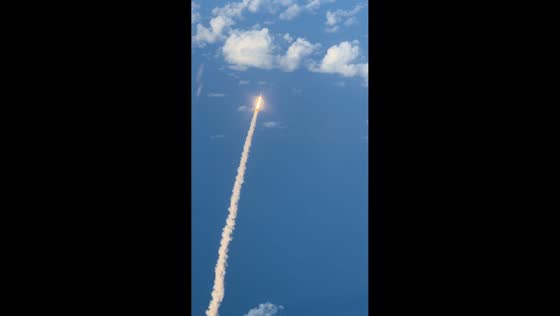 Artemis II rocket launch filmed from airplane window over Florida, USA