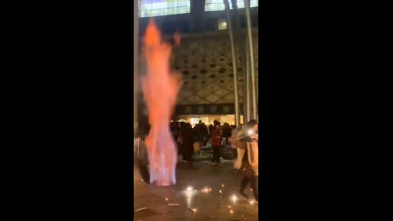Fiery new year's surprise: Zhengzhou women's fireworks ignite manhole blaze!