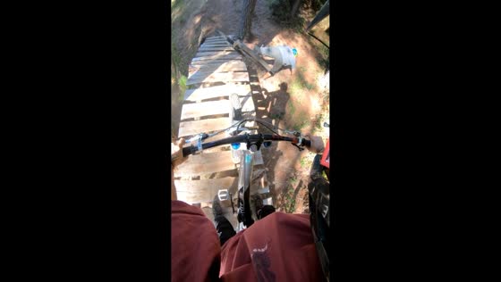  Mountain biker falls off narrow wooden plank bridge in Gorbea, Chile