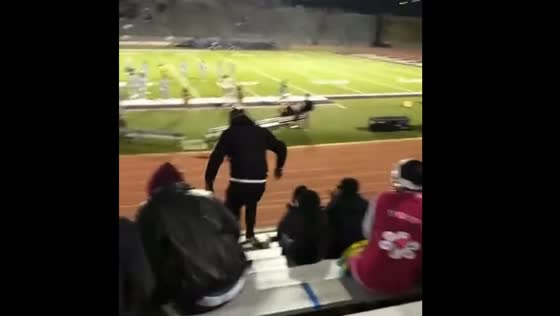 Man dancing on bleachers in Houston falls down