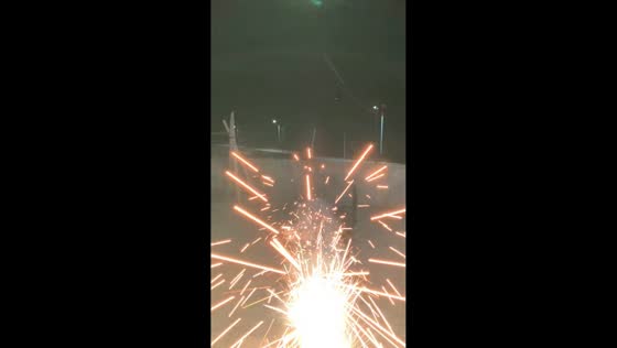 Person runs as firecracker sparks toward her in Guangdong, China