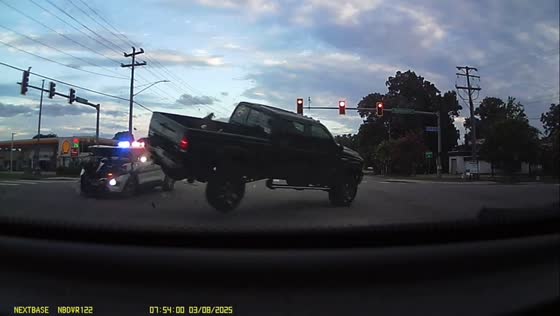 Police SUV collides with truck at intersection in Virginia Beach, Virginia, USA