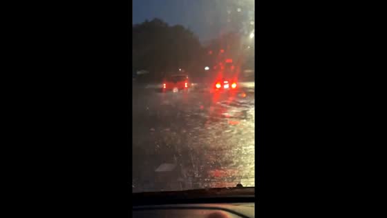 Car sunk on Indian Hills Drive, truck barely makes it through