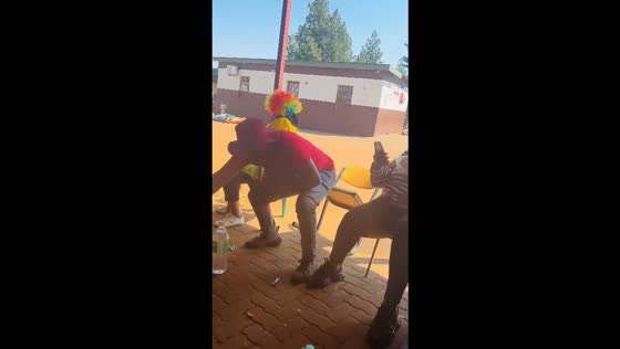 Man falls after missing his chair during Spring Day celebration in Rustenburg, South Africa