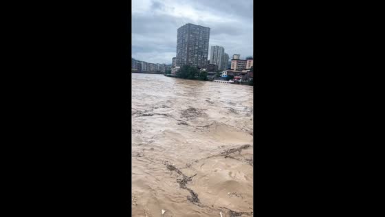 Extreme flooding sends muddy waters surging through Dazhou, China