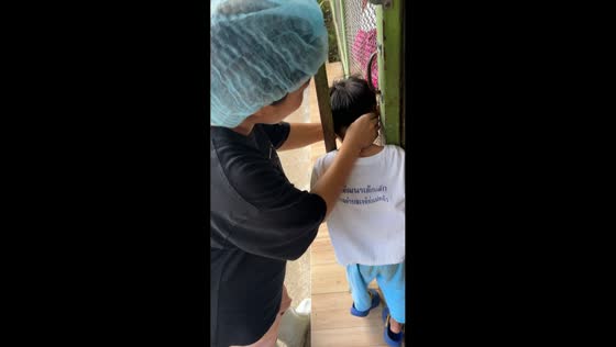 Boy gets stuck in steel frame near gate and frees himself in Chiang Mai, Thailand