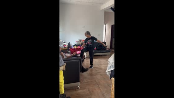 Elderly couple playful interaction at home in Caracas, Venezuela