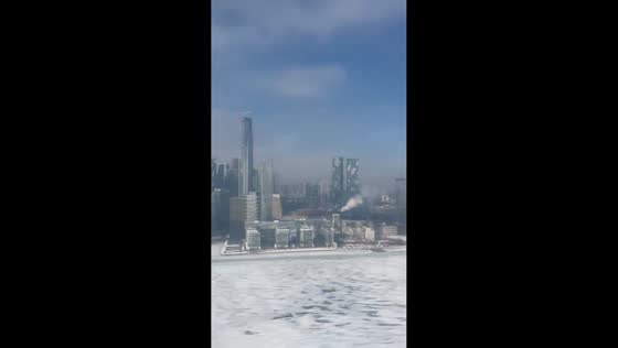 Snow-covered touchdown at Toronto Billy Bishop City Centre Airport in Toronto, Ontario, Canada