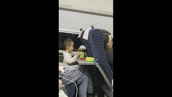 Child falls with a chair while eating instant noodles in Guizhou, China