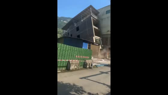 Multi-story residential building collapses in Yunnan, China