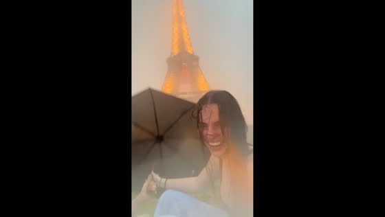 Eiffel Tower shrouded by heavy storm in Paris, France