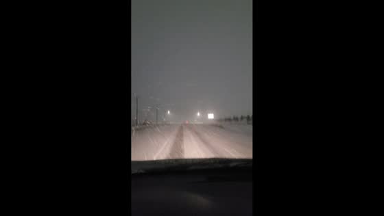 Whiteout winter storm creates dangerous, low-visibility highway drive in Shakopee, USA