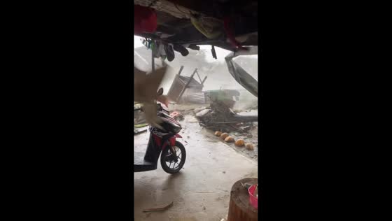 Super Typhoon Nando damages houses and sweeps streets in Nagsayaoan, Philippines